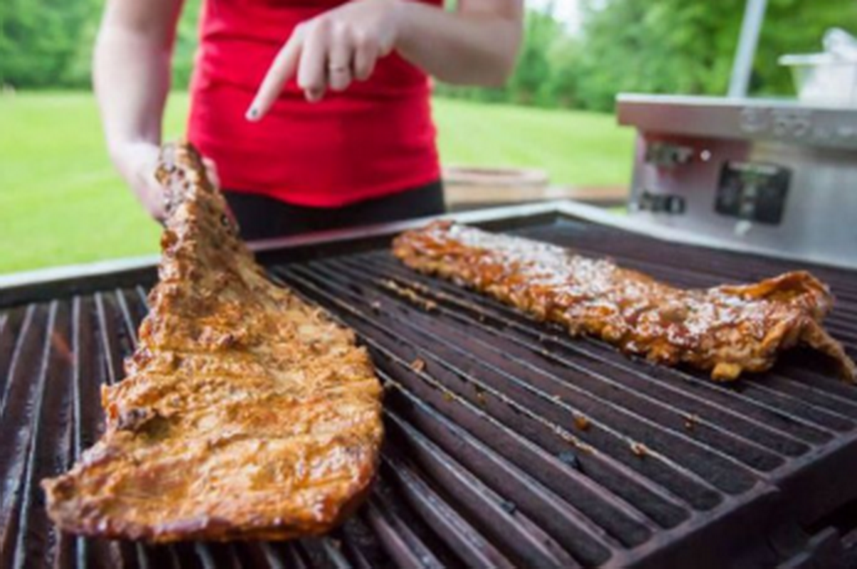 How do Americans have outdoor barbecue parties?